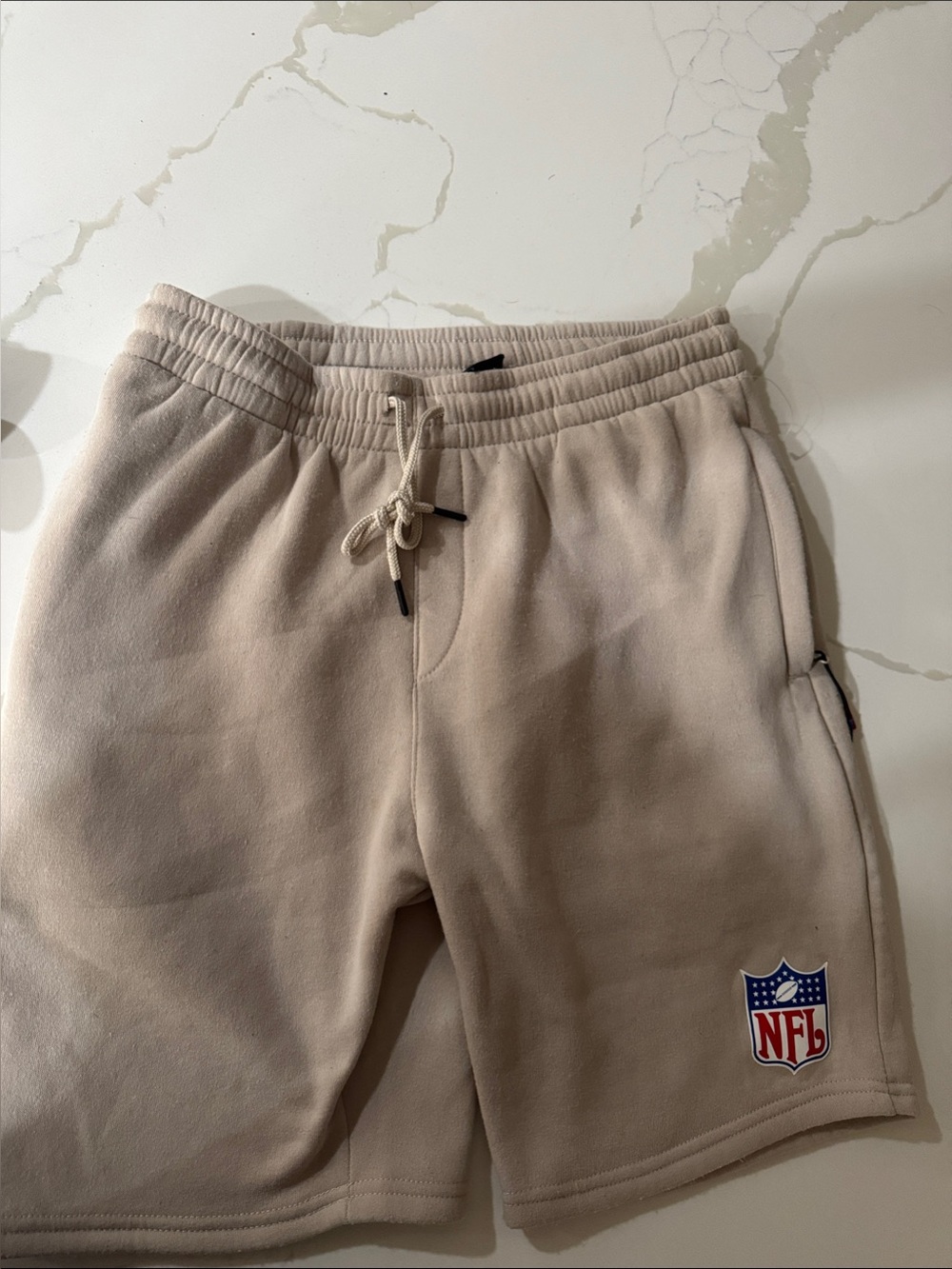 NFL Men's Beige Athletic Shorts with NFL Shield Patch